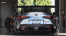 Exhaust Cutout Cover - Mk5 Toyota Supra